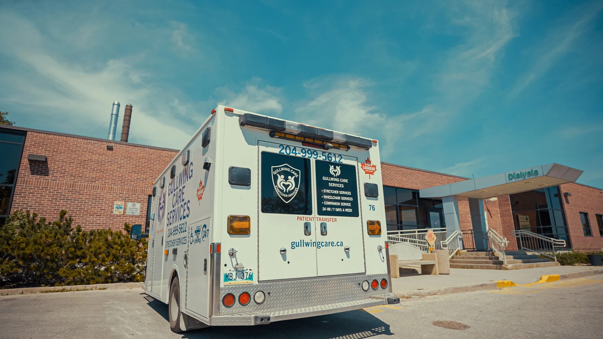 Gullwing Care transport vehicle outside a dialysis facility