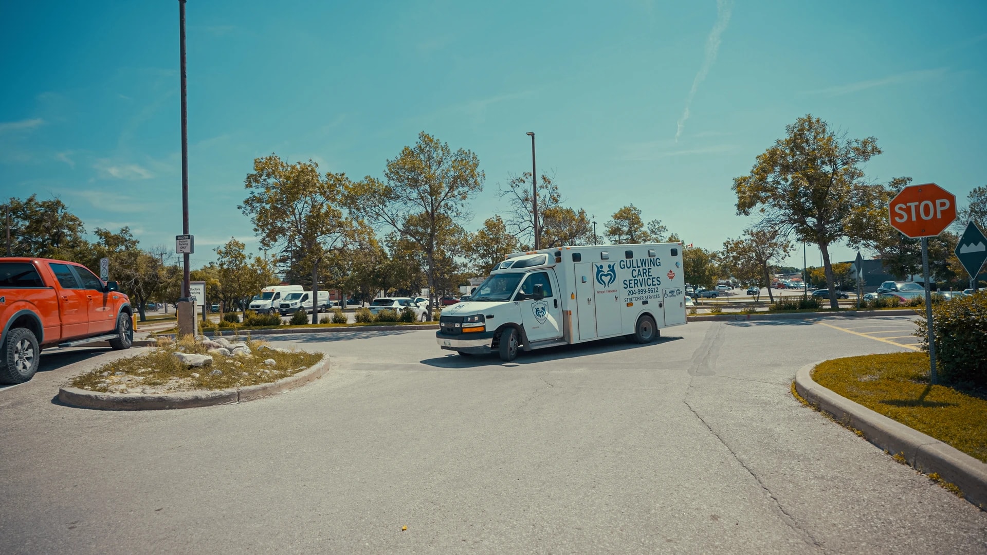 A Gullwing Care vehicle arriving at a healthcare facility